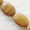 Perles de bois en pierre , pierre de grain, ovale, naturel pouce Vendu par brin