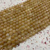 braune Wassermelone Perle, rund, poliert, DIY, gelb, Länge:ca. 38 cm, verkauft von Strang