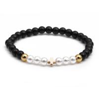 Black Stone Bracelet, with Plastic Pearl & Brass, gold color plated, elastic .48 Inch 