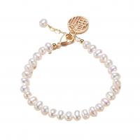 bracelet en laiton de perle d'eau douce cultivée, avec laiton, avec 4cm chaînes de rallonge, Plaqué d'or 14K, Naturel & bijoux de mode & pour femme, deux couleurs différentes, 4.5-5.5mm cm, Vendu par brin