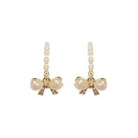 Plastic Pearl Zinc Alloy Earring, with Zinc Alloy, Bowknot, gold color plated, Korean style & for woman & with rhinestone 
