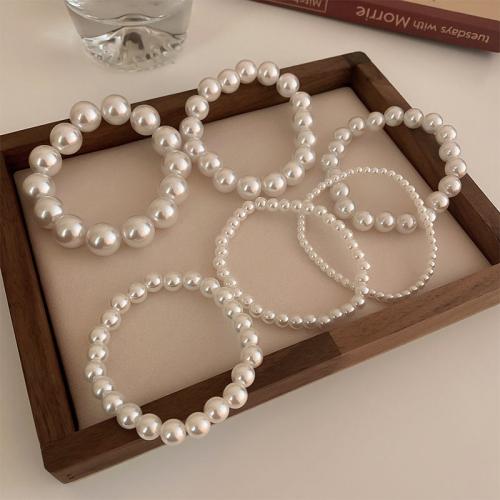 Plastic Pearl Bracelets, ABS Plastic Pearl, with Elastic Thread, fashion jewelry & Unisex white Approx 18 cm 