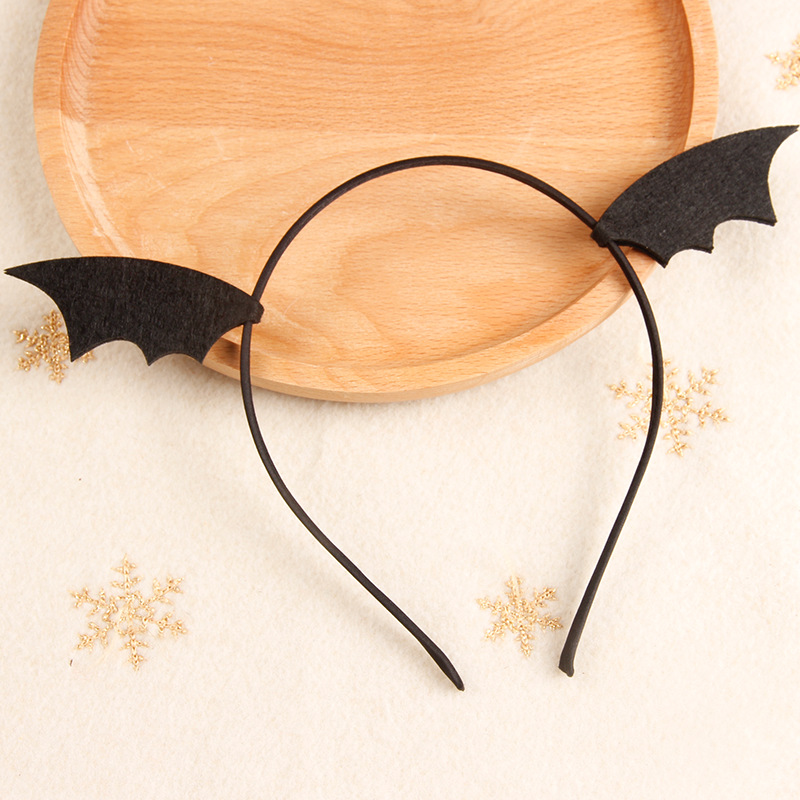 Small black bat wing hair band
