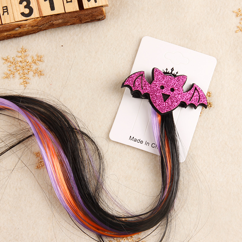 Purple bat flutters hair pins