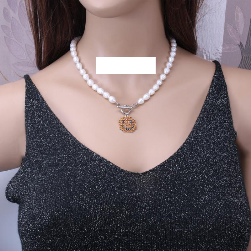 Oval pearl + crystal smiling face style