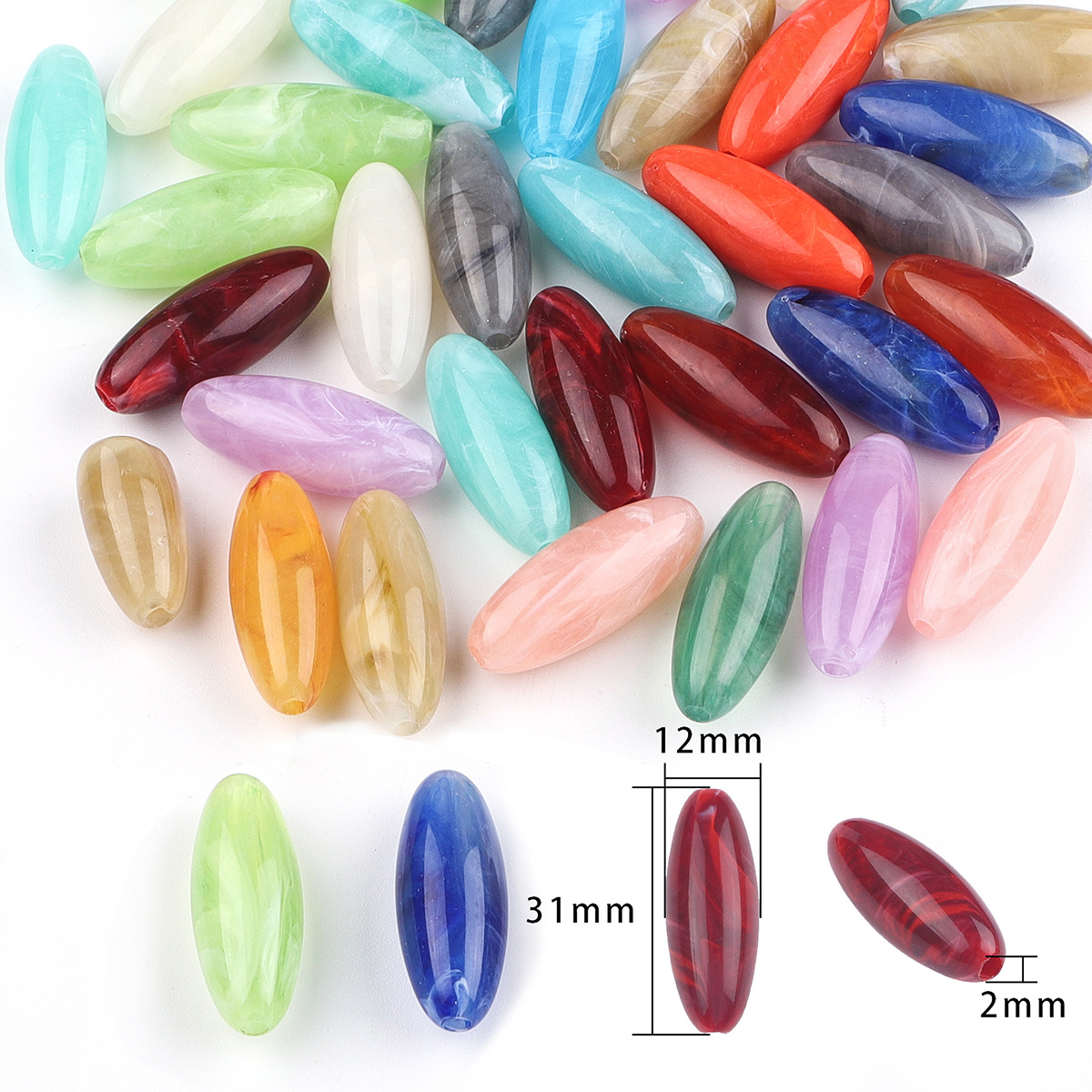 Long oval beads 31x12mm aperture about 2mm random