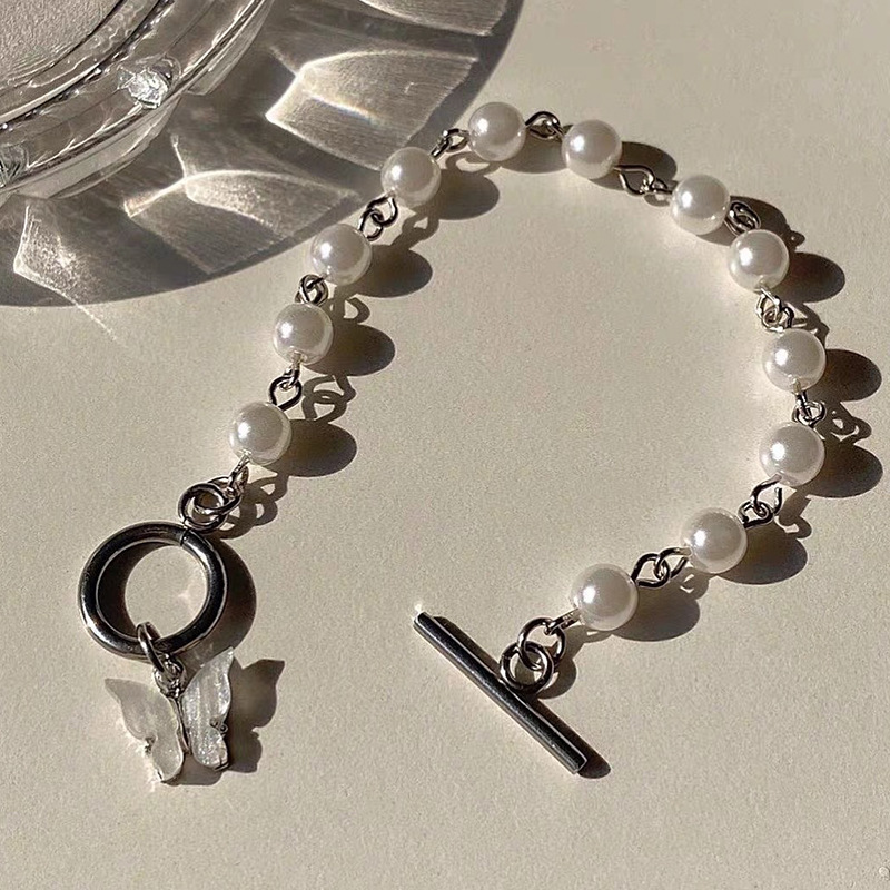 White butterfly imitation pearl bracelet