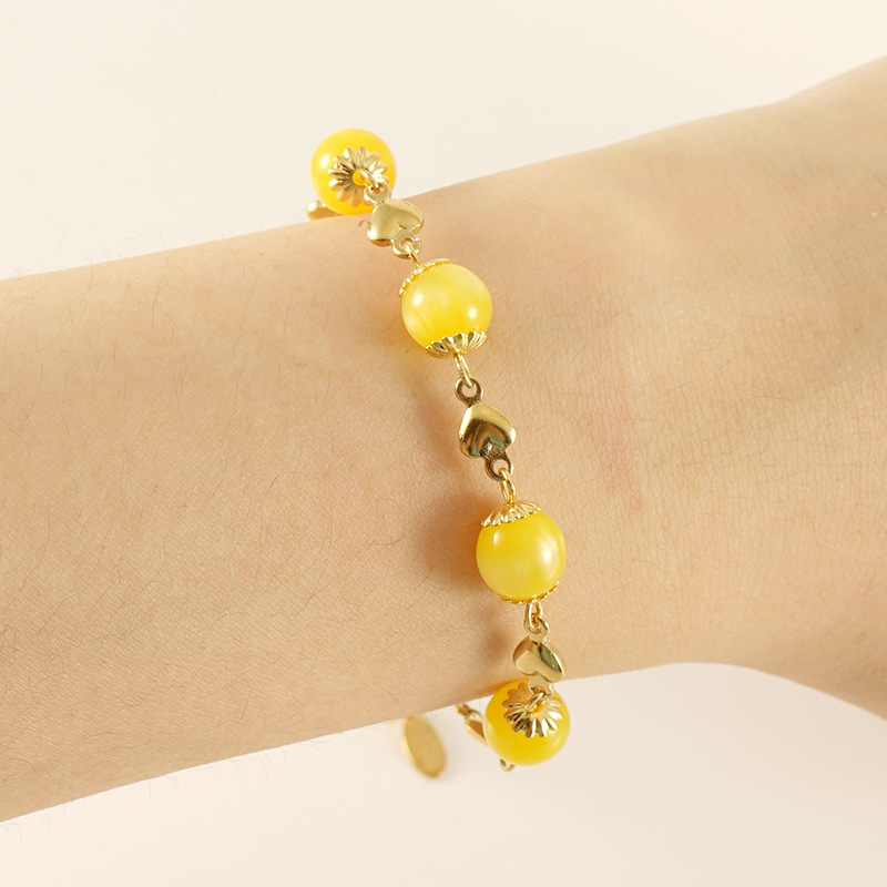 Five yellow beads