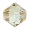 Perle bicône Xilion cristal CRYSTALLIZED™5328, CRYSTALLIZED™, facettes, Cristal doré, 3mm Vendu par sac