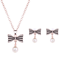 Rhinestone Zinc Alloy Jewelry Set, earring & necklace, with ABS Plastic Pearl & plastic earnut & iron chain, stainless steel post pin, with 5cm extender chain, Bowknot, rose gold color plated, oval chain & with rhinestone, lead & cadmium free  Approx 16.5 Inch 