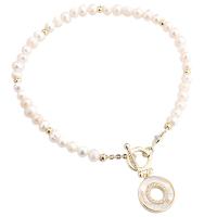 bracelet en laiton de perle d'eau douce cultivée, avec laiton, Placage de couleur d'or, pavé de micro zircon & pour femme, blanc .67 pouce, Vendu par brin