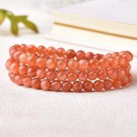 Bracelets quartz, Strawberry Quartz, orange rougeâtre, 5mm, Vendu par brin