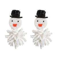 Boucles d'oreilles de Noël, Seedbead, bonhomme de neige, Conception de Noël & pour femme, blanc et noir Vendu par paire