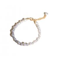 Bracelets de perles En alliage de zinc , perle d'eau douce cultivée, avec alliage de zinc, Alliage de zinc fermoir homard, pour femme & avec strass, couleurs mélangées, 5-6mm Environ 21 cm, Vendu par PC