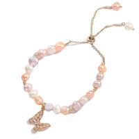 Cultured Freshwater Pearl Brass Bracelet, with Brass, Butterfly, 14K gold plated, Adjustable & fashion jewelry & micro pave cubic zirconia & for woman, pink Approx 24 cm 