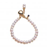 bracelet en laiton de perle d'eau douce cultivée, avec laiton, avec 4cm chaînes de rallonge, Plaqué d'or 14K, Naturel & bijoux de mode & pour femme, blanc, 6-7mm cm, Vendu par brin