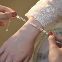 bracelet en laiton de perle d'eau douce cultivée, avec Alliage de cuivre, avec 1.57inch chaînes de rallonge, Placage de couleur d'or, bijoux de mode & pour femme, blanc, 2-6mm Environ 7.48 pouce, Vendu par PC
