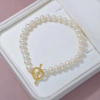 bracelet en laiton de perle d'eau douce cultivée, avec laiton, bijoux de mode & pour femme, blanc, 6-7mm Environ 7.5 pouce, Vendu par PC