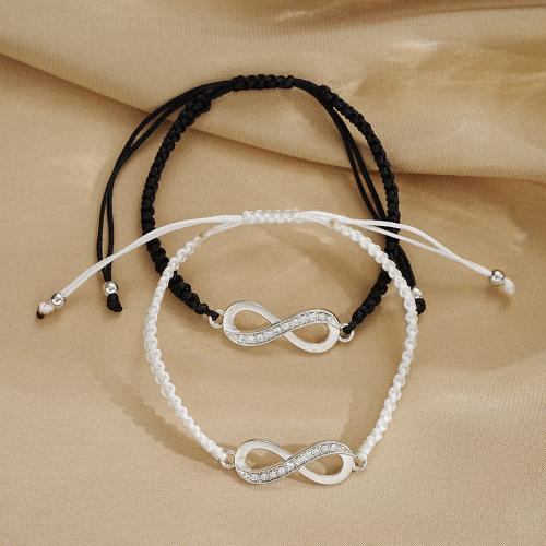 Bracelets En alliage de zinc, avec cordon de polyester & cristal, fait à la main, bijoux de mode & unisexe & creux, blanc et noir cm, Vendu par paire