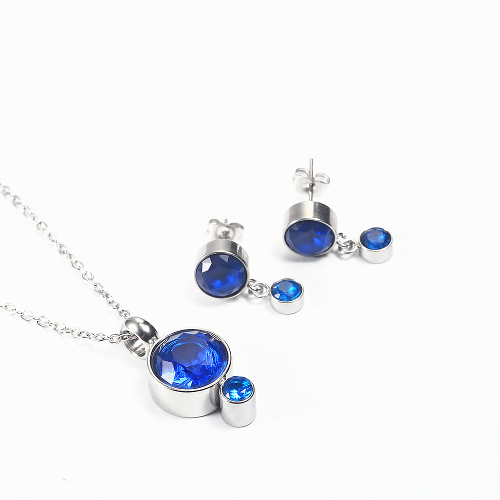 2 silver color plated with blue rhinestone