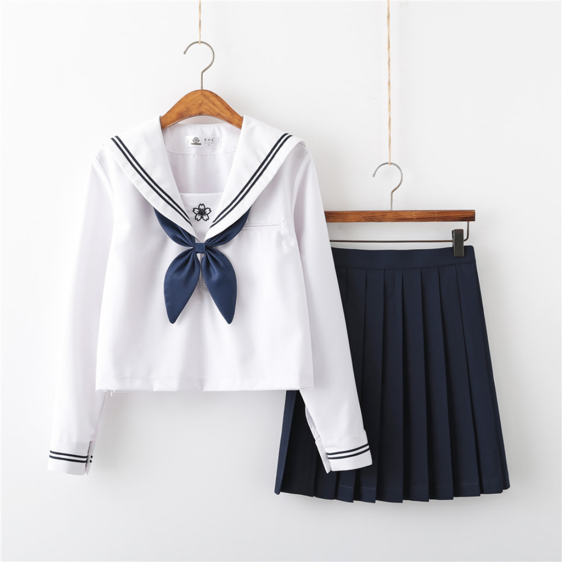 Long sleeve short skirt   bow tie