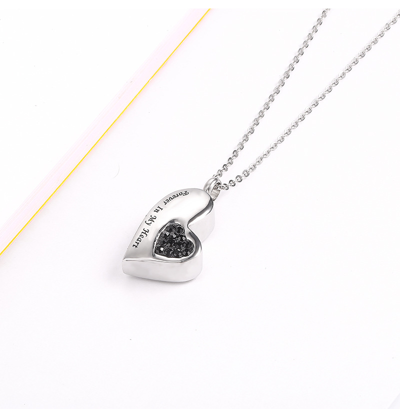10:Black diamond pendant and silver chain