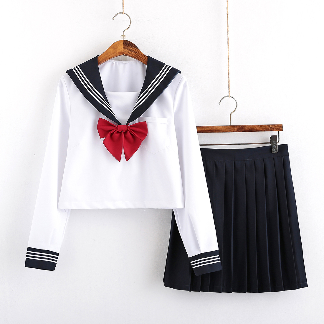 Short long - sleeved skirt with bow