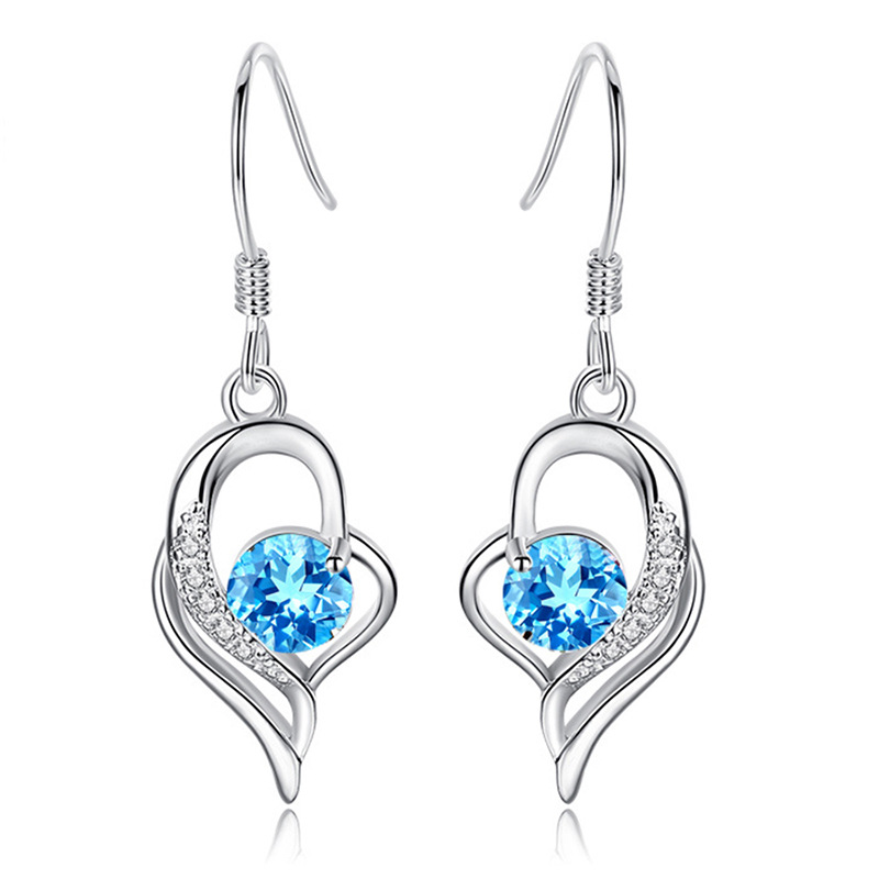 A pair of blue diamond earrings