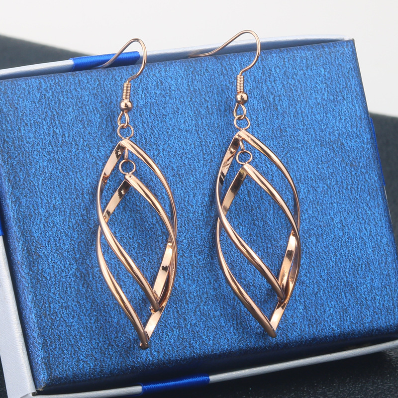 A pair of rose gold
