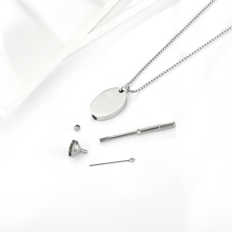 Pendant with chain + funnel + removal tool
