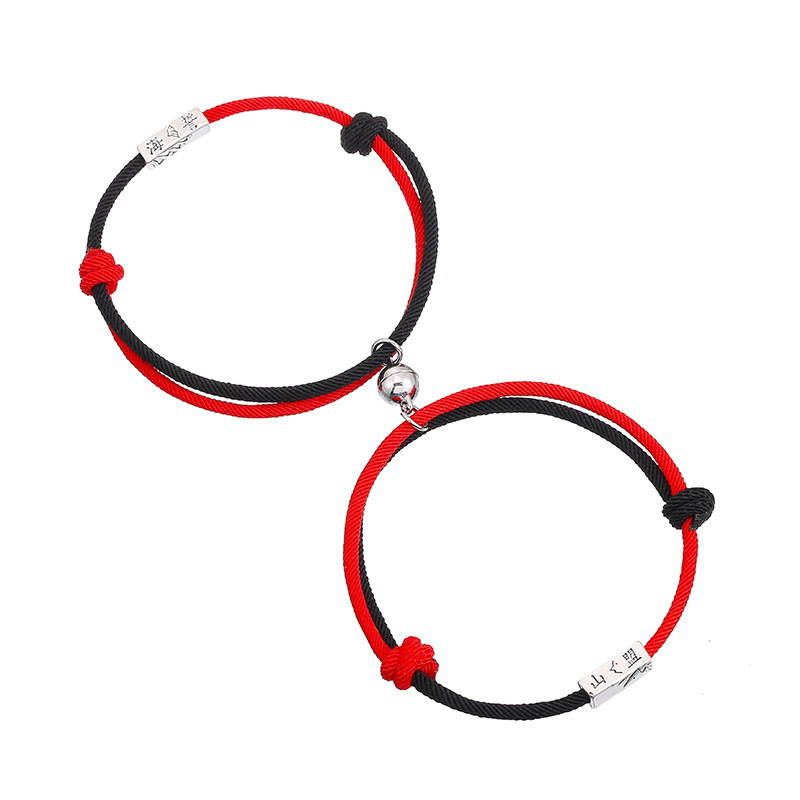 A pair of Milan two-tone black and red eachother