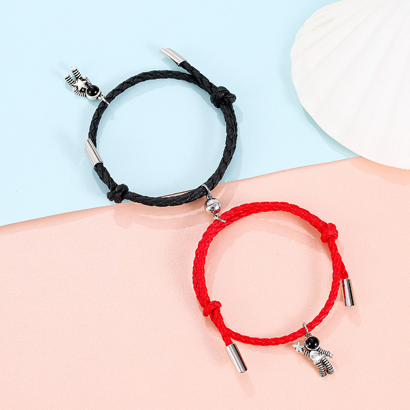 A pair of PU black and red rope astronauts