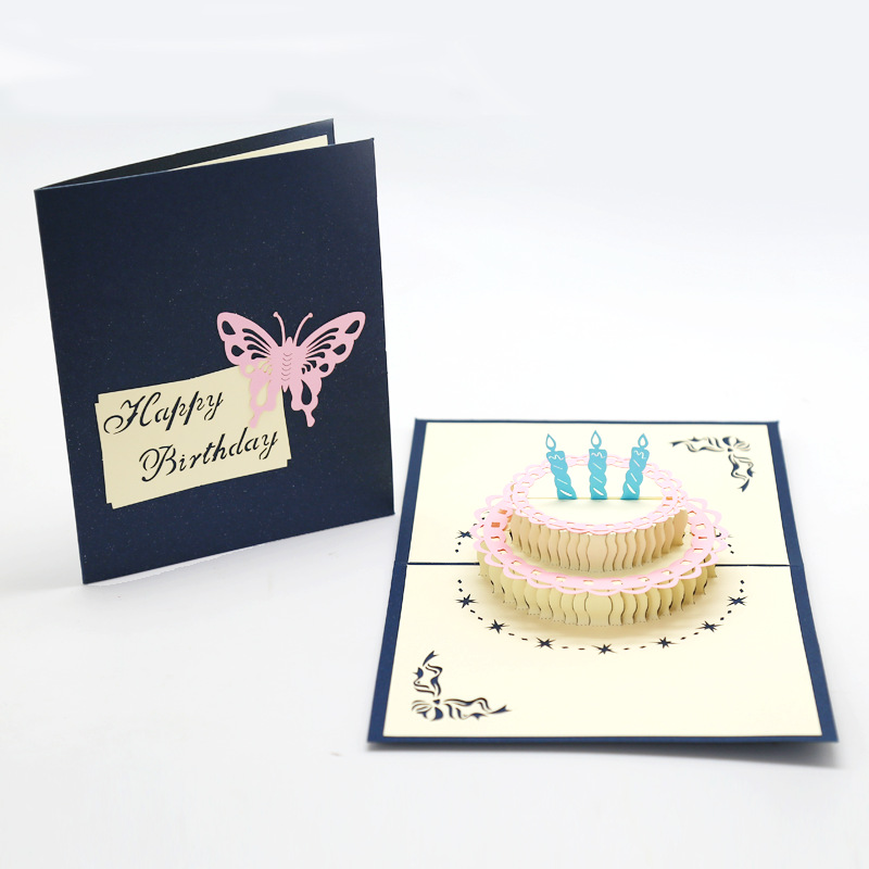 Blue card with pink rim and blue candle