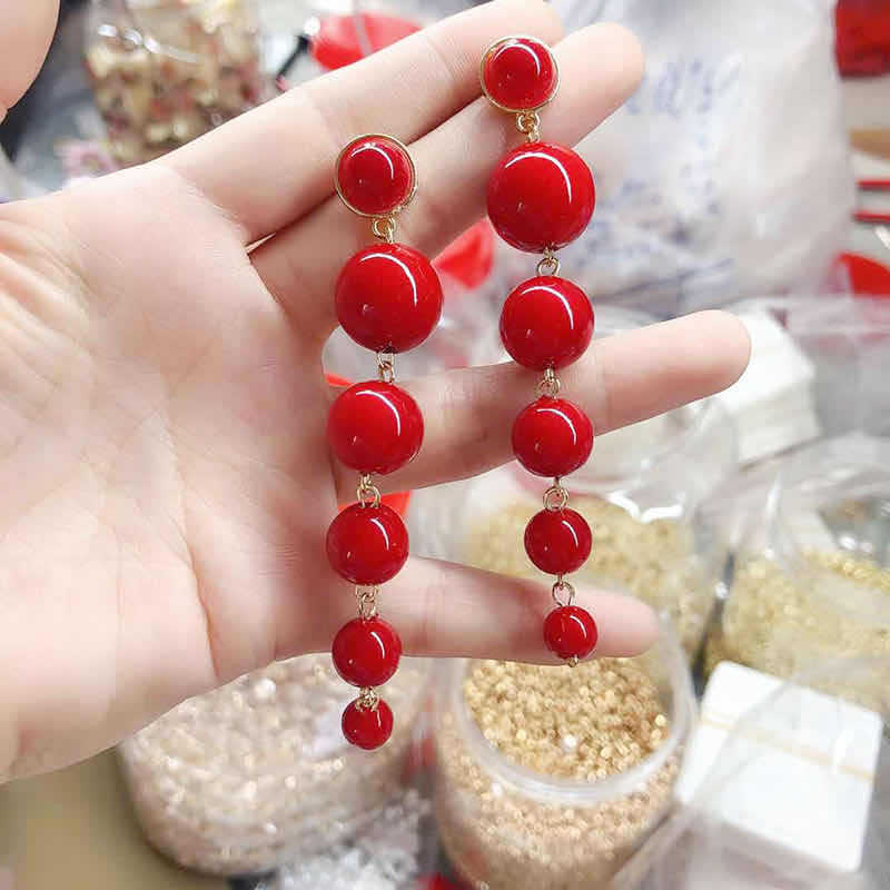 red earring clip