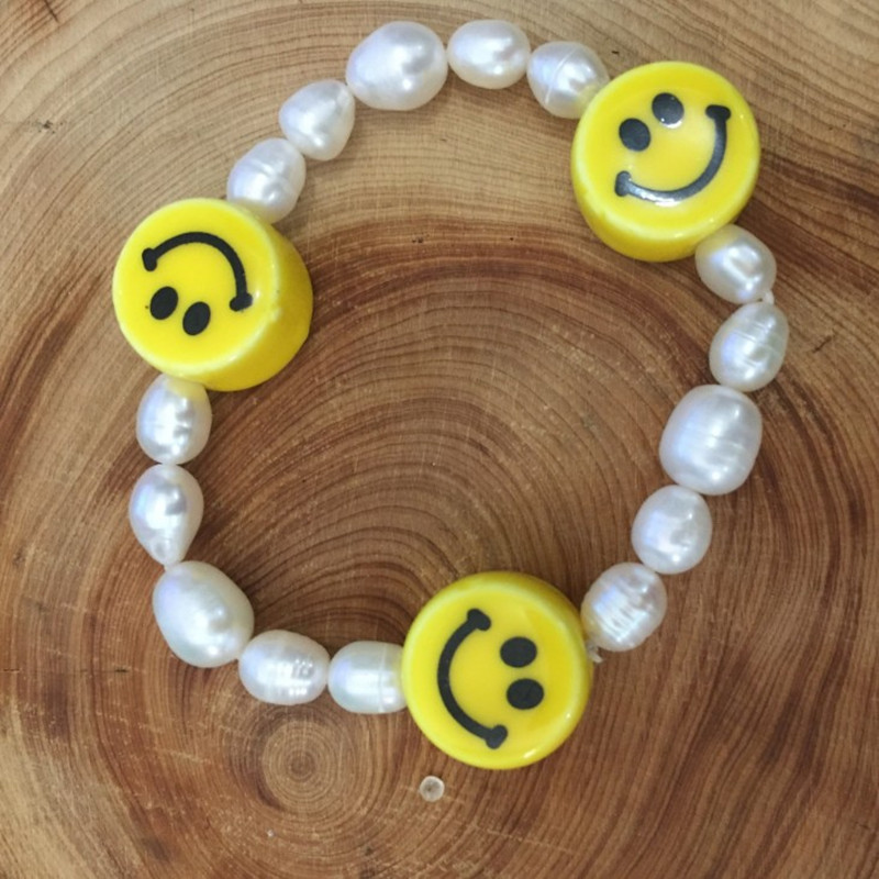 3:Three smiley face bracelets