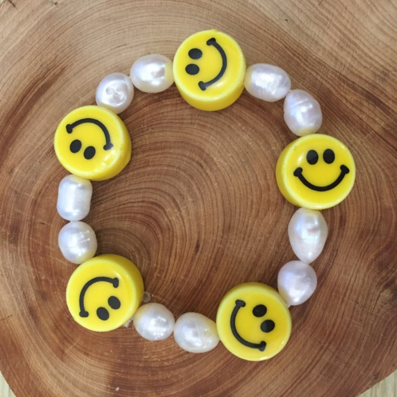 Five smiley face bracelets