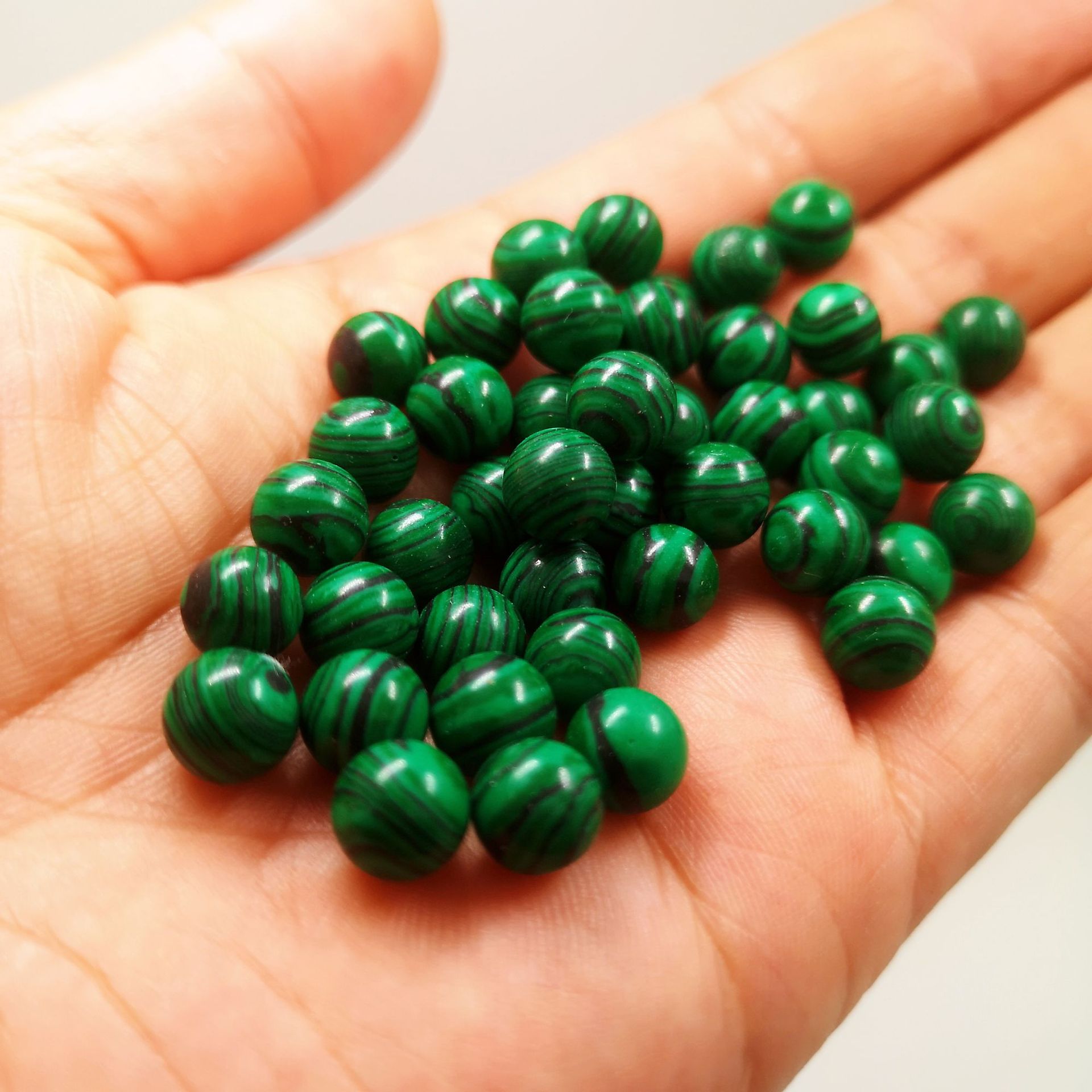 Malachite [half-hole bead]
