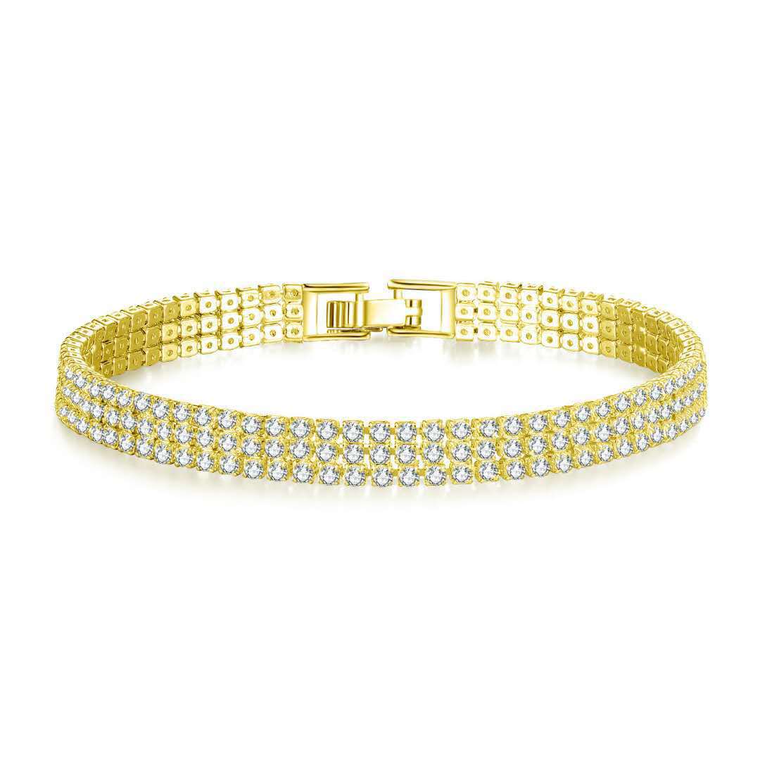 Two rows of gold-plated bracelets