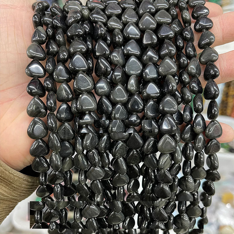 Natural obsidian heart shape