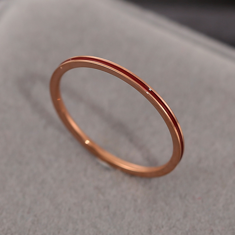 rose gold color plated with red enamel