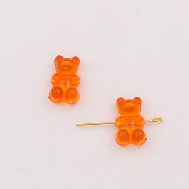 Orange cross hole bear channeling beads