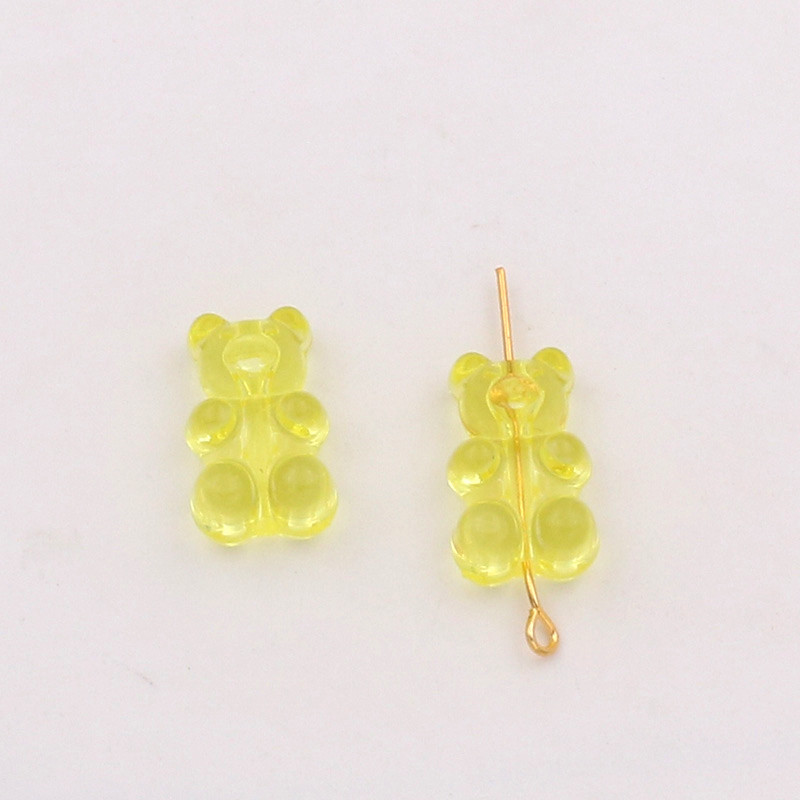 Yellow vertical hole bear channeling beads