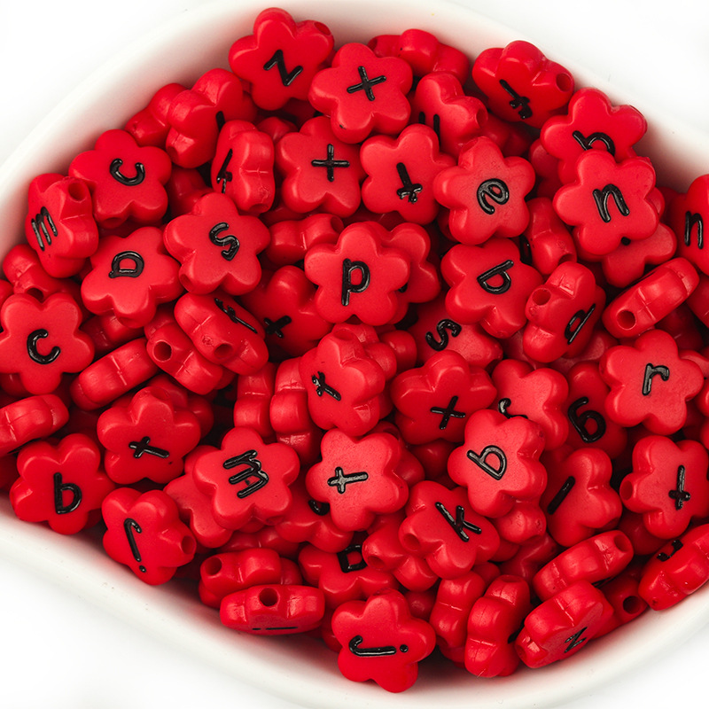 Red with black lowercase letters in a pack of 100,