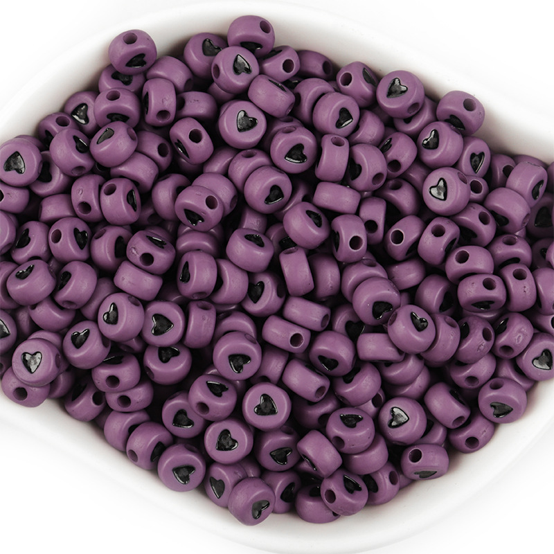 Purple with black hearts in a pack of 100,