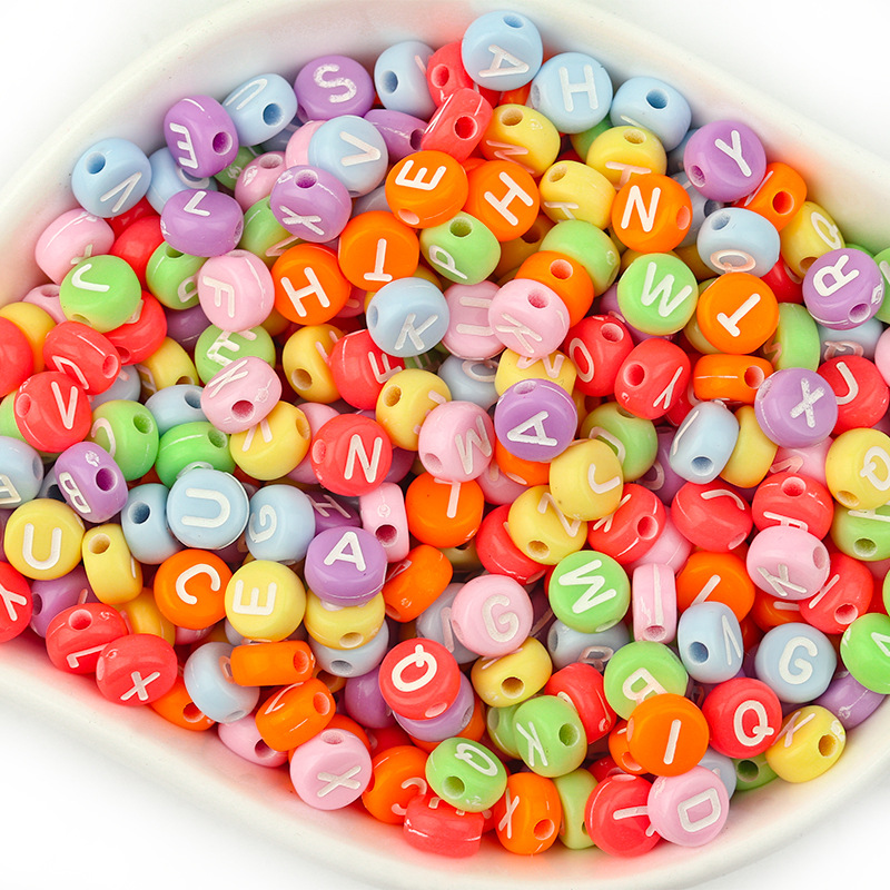 A pack of 100 mixed colors with white letters,