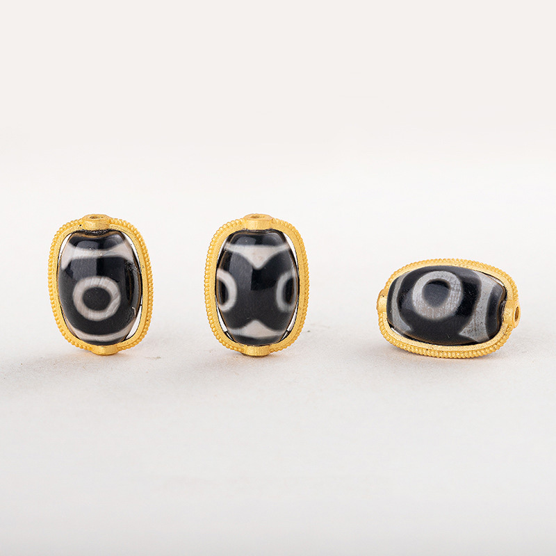 3:The three - eyed Dzi Beads ( about 10*17mm ) / pc