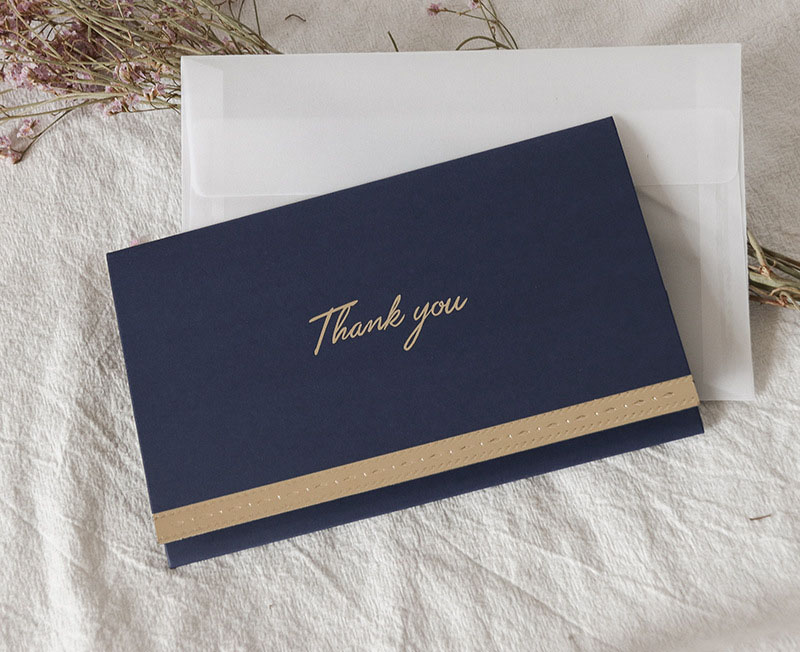 Navy blue thank you greeting card + envelope + han