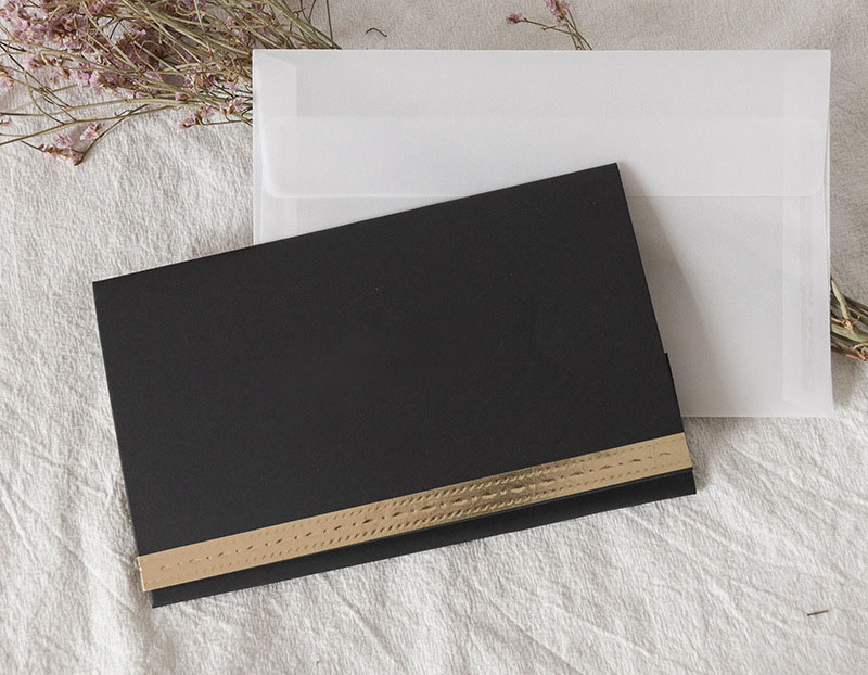 Black blank greeting card + envelope + handwriting