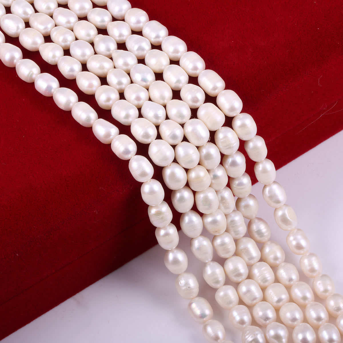 White 9-10mm, about 34 beads/strand