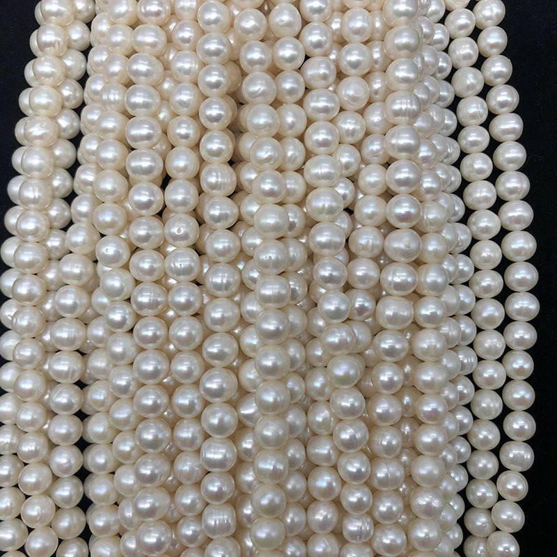 White, about 42 beads/strand